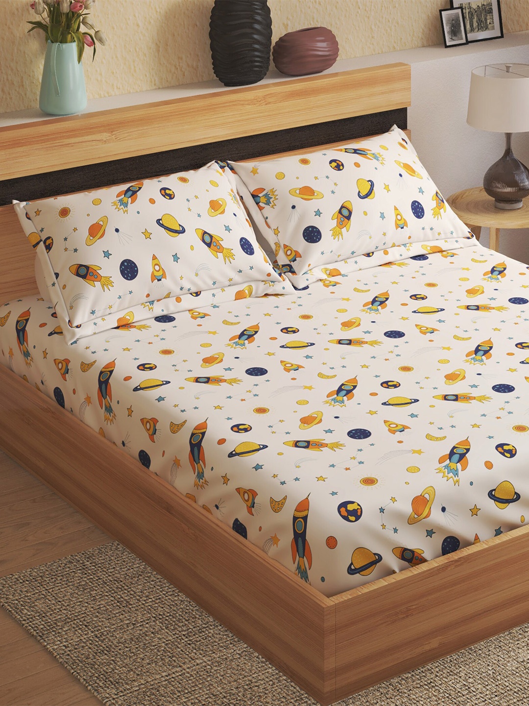 

Home Centre White & Yellow Conversational 150 TC Cotton Queen Bedsheet & 2 Pillow Covers