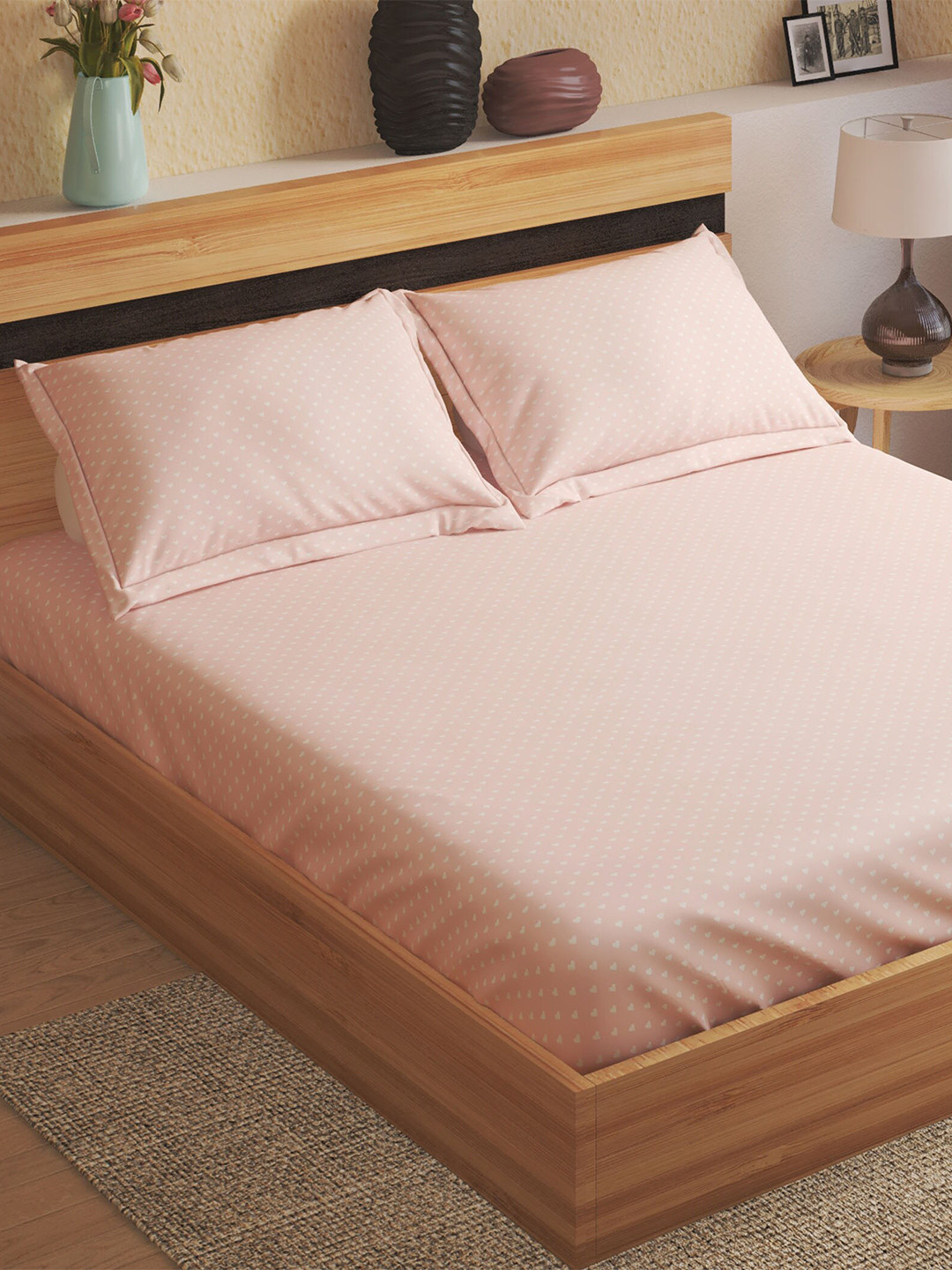 

Home Centre Pink & White Geometric 150 TC Cotton Queen Bedsheet With 2 Pillow Covers