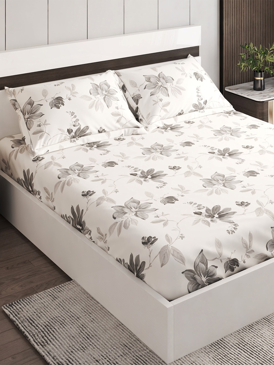 

Home Centre Grey & White Floral 144 TC Cotton King Bedsheet With 2 Pillow Covers