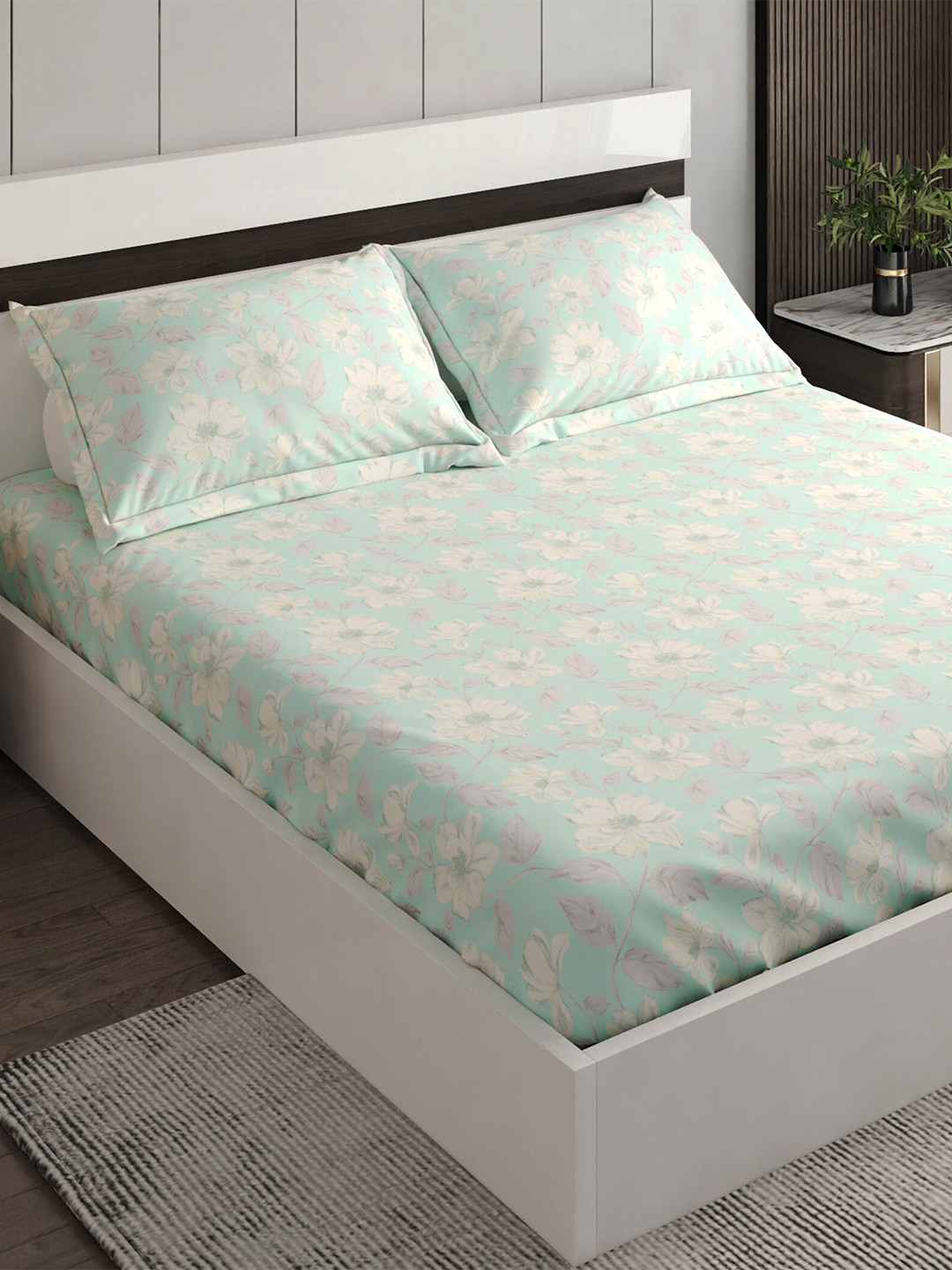 

Home Centre Teal & White Floral 144 TC Cotton King Bedsheet With 2 Pillow Covers
