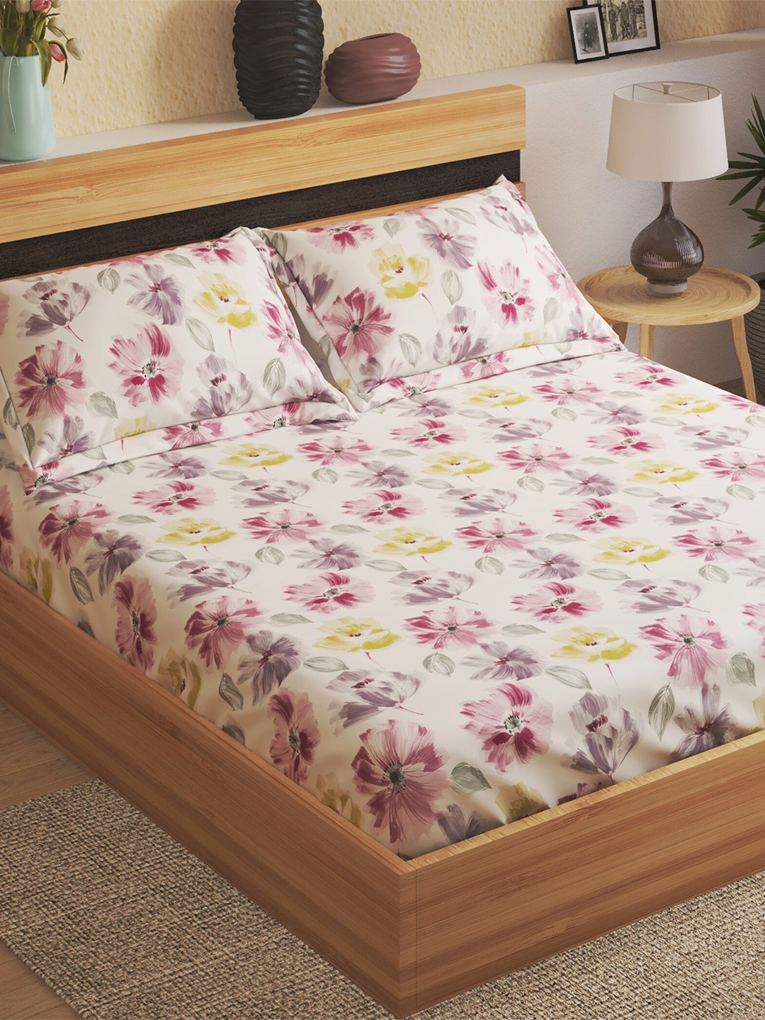 

Home Centre Purple & White Floral Cotton 144 TC King Bedsheet With 2 Pillow Covers