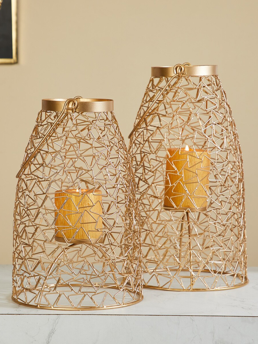 

Home Centre Gold-Toned Textured Metal Wired Hanging Votive Holder
