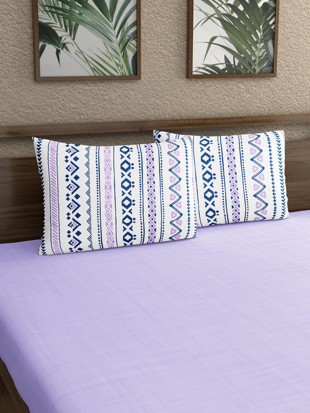 

Home Ecstasy White & Purple 2 Pieces Printed 140 TC Pure Cotton Pillow Covers