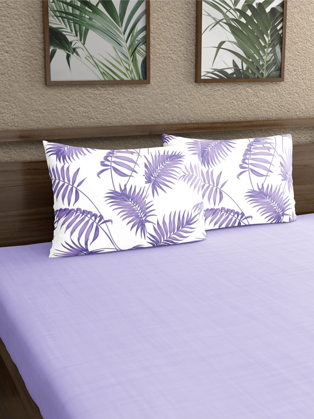

Home Ecstasy White & Purple 2 Pieces Printed 140 TC Pure Cotton Pillow Covers