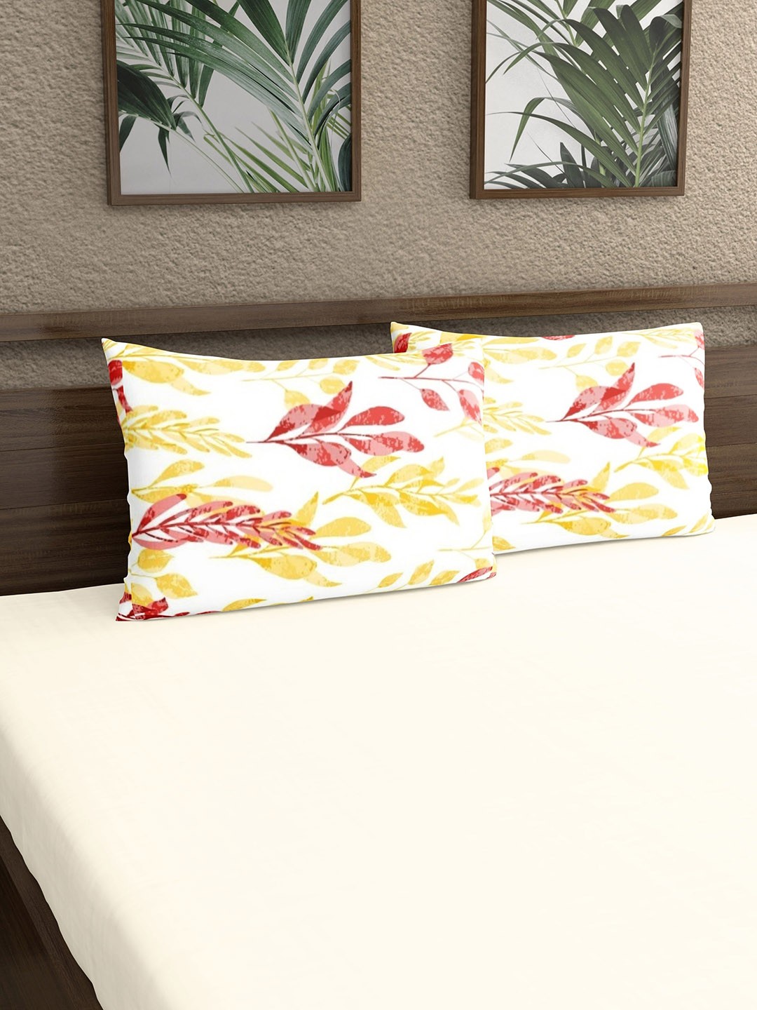 

Home Ecstasy White & Yellow 2 Pieces Printed 140 TC Pure Cotton Pillow Covers