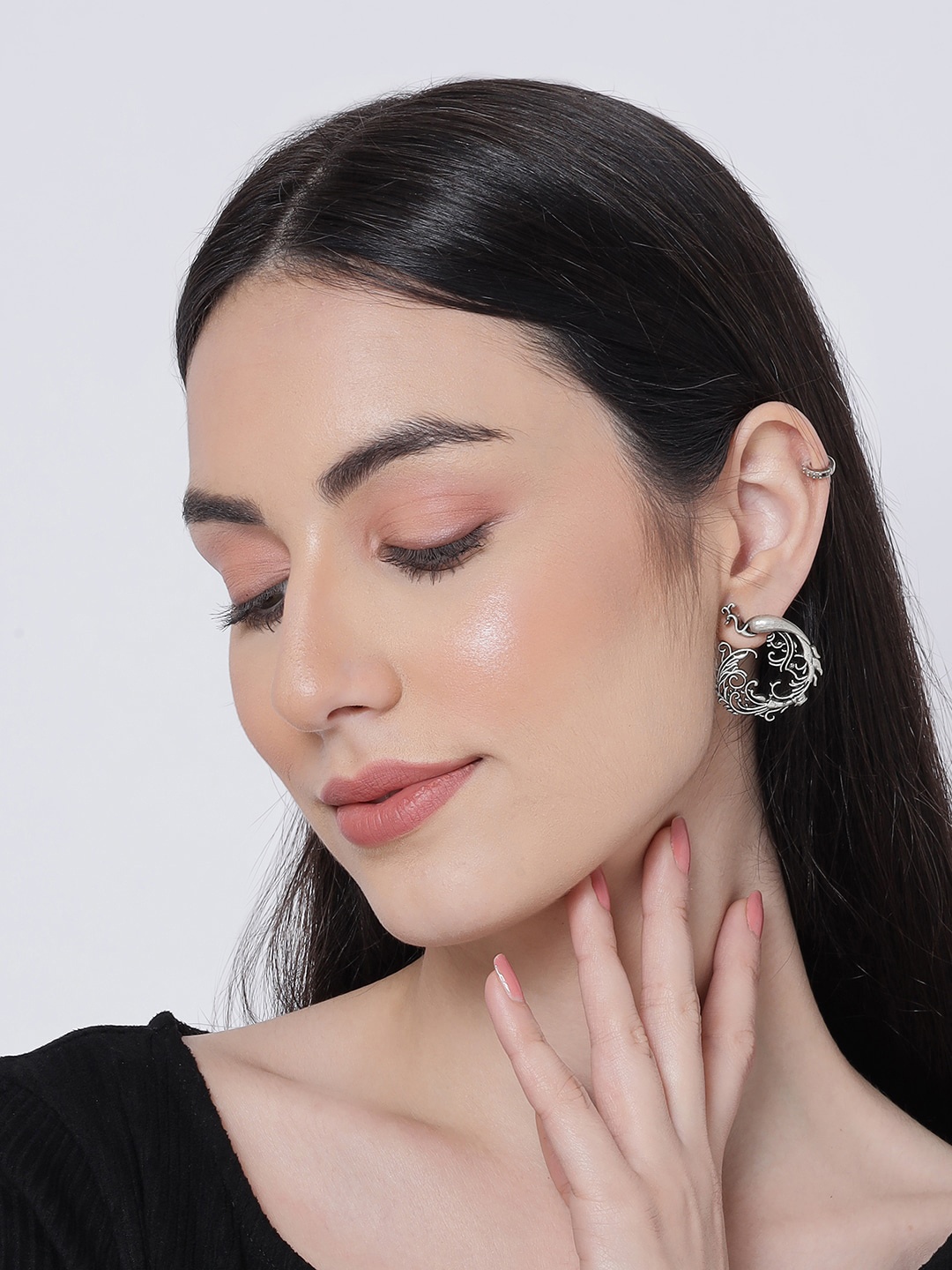 

Sangria Silver-Plated Peacock Shaped Oxidized Studs Earrings