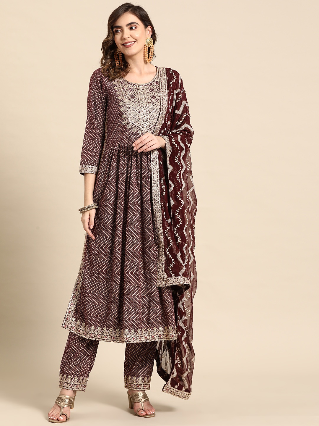 

Prakhya Women Floral Yoke Design Pleated Sequinned Kurta with Palazzos & With Dupatta, Brown