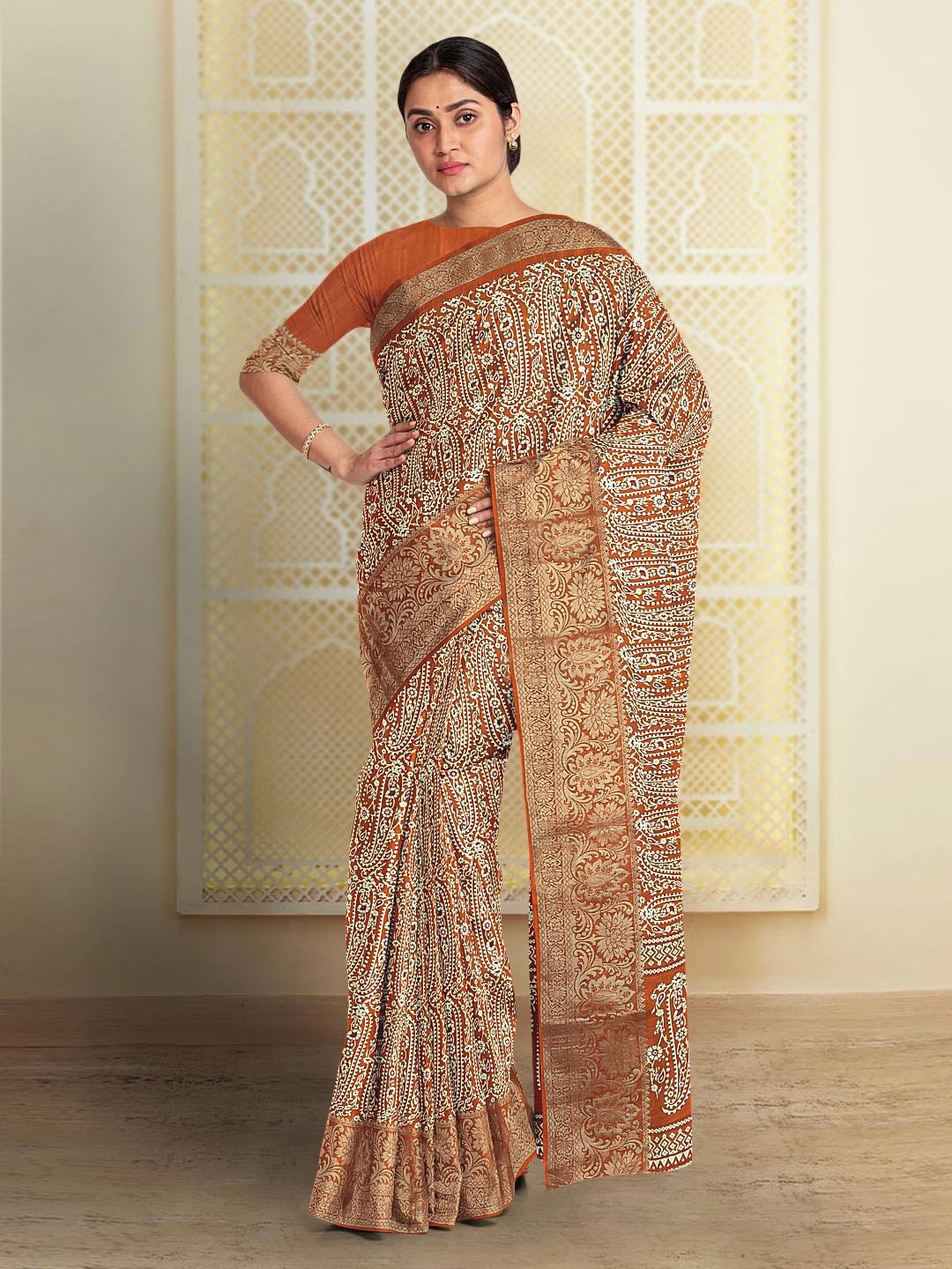 

Kalamandir Paisley Printed Silk Blend Saree, Rust