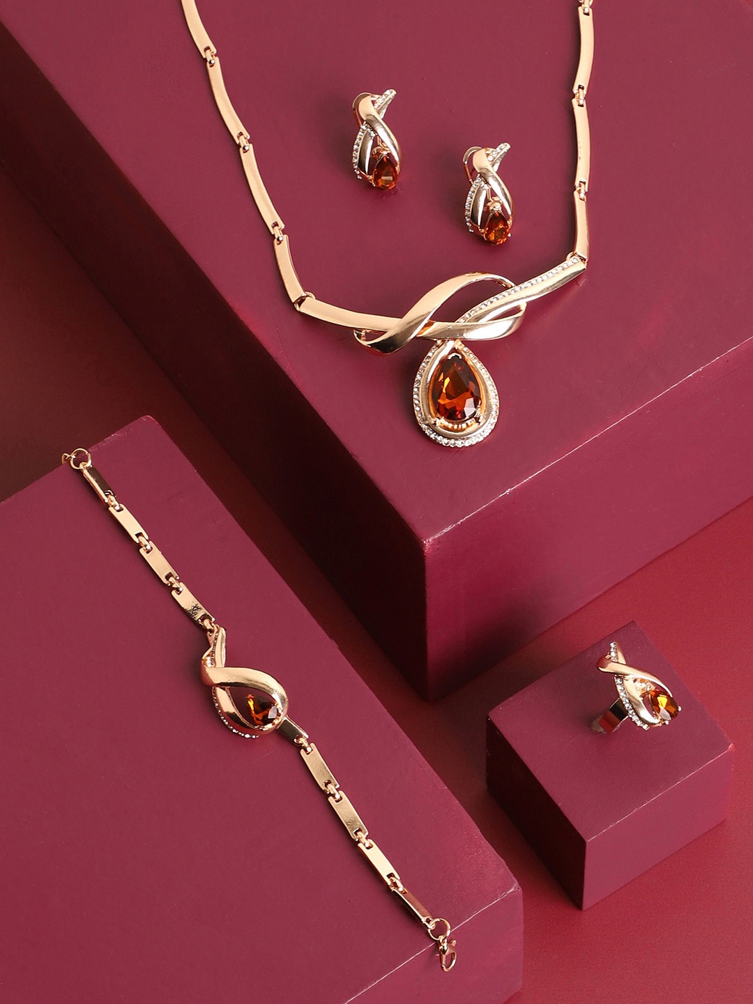 

SOHI Gold-Plated Stone-Studded Jewellery Set With Bracelet & Finger Ring