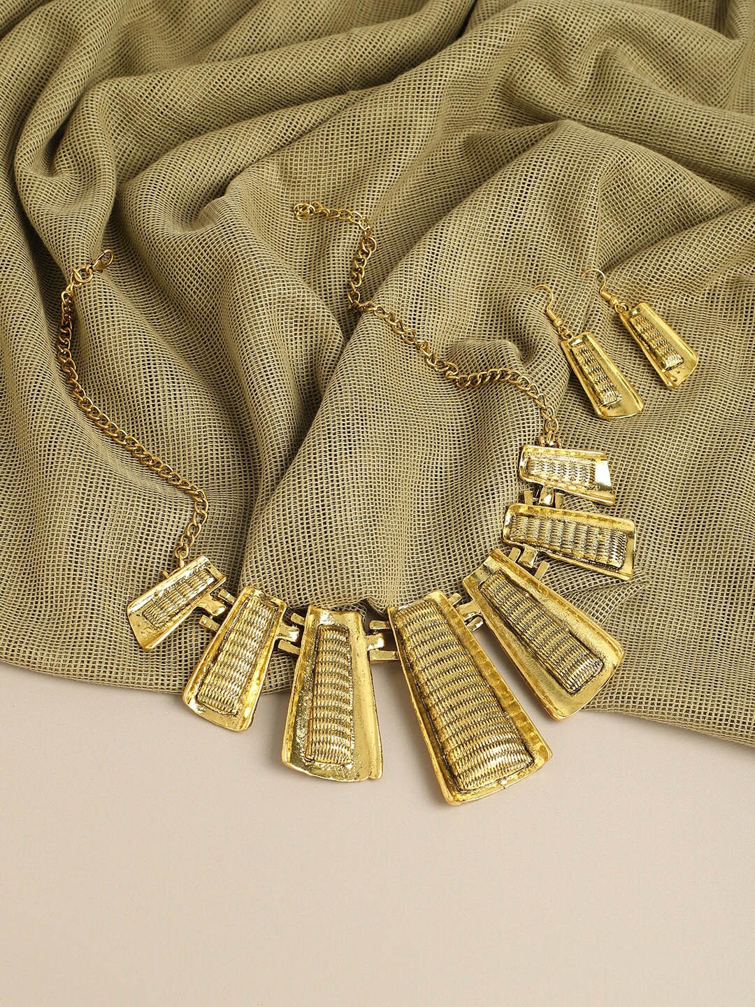 

SOHI Gold-Plated Textured Designer Jewellery Set
