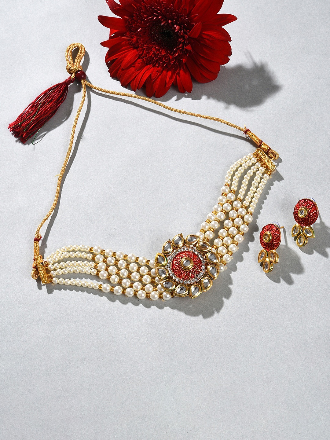 

SOHI Gold-Plated Stone-Studded & Beaded layered Necklace & Earrings