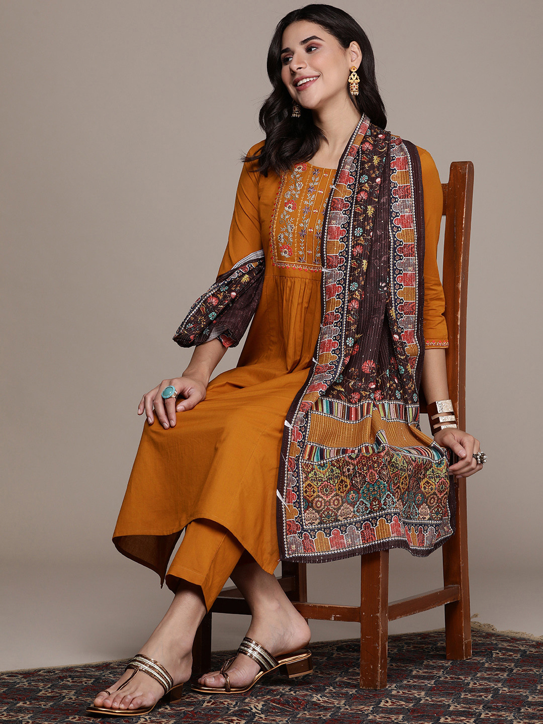 

Anouk Women Floral Embroidered Regular Pure Cotton Kurta with Trousers & With Dupatta, Mustard