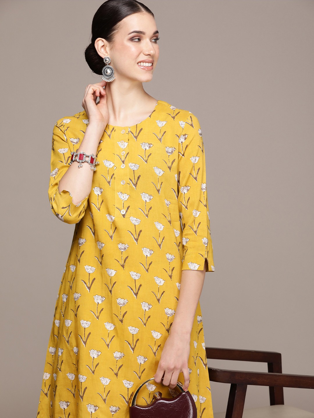 

Anouk Women Floral Printed A-Line Kurta, Mustard