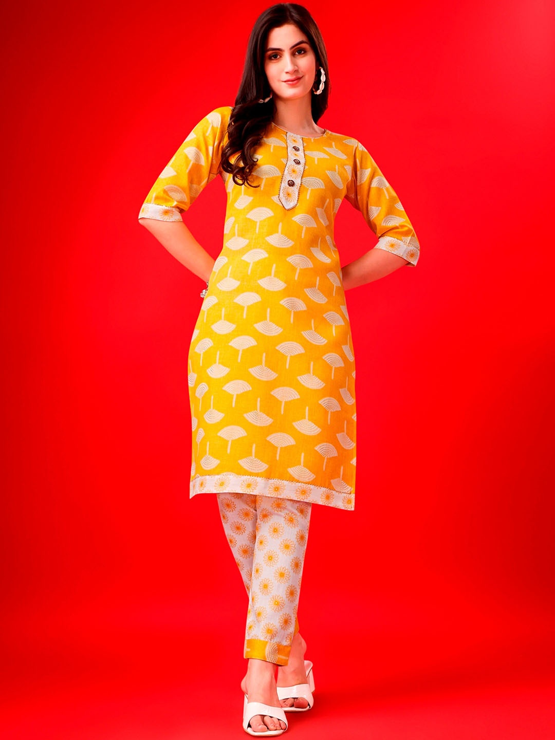 

Vaidehi Fashion Floral Printed Regular Gotta Patti Kurta with Trousers, Yellow