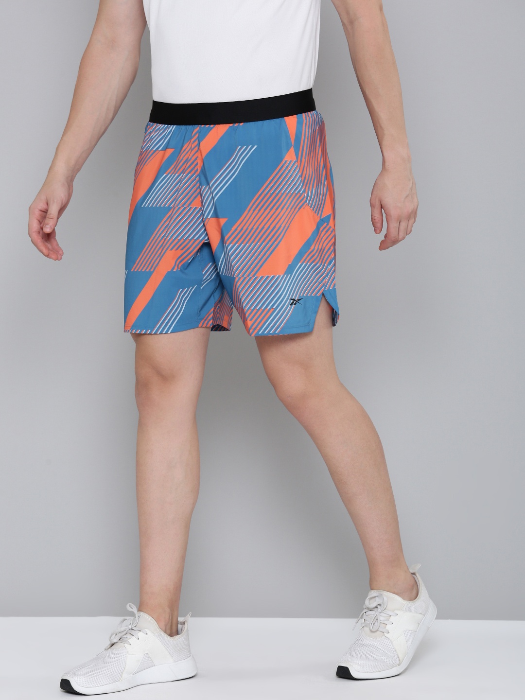 

Reebok Men Geometric Printed Sports Shorts, Blue