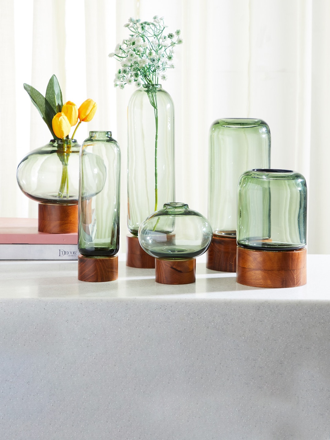 

Home Centre Fern Living Green & Brown Glass Round Vase With Wooden Base