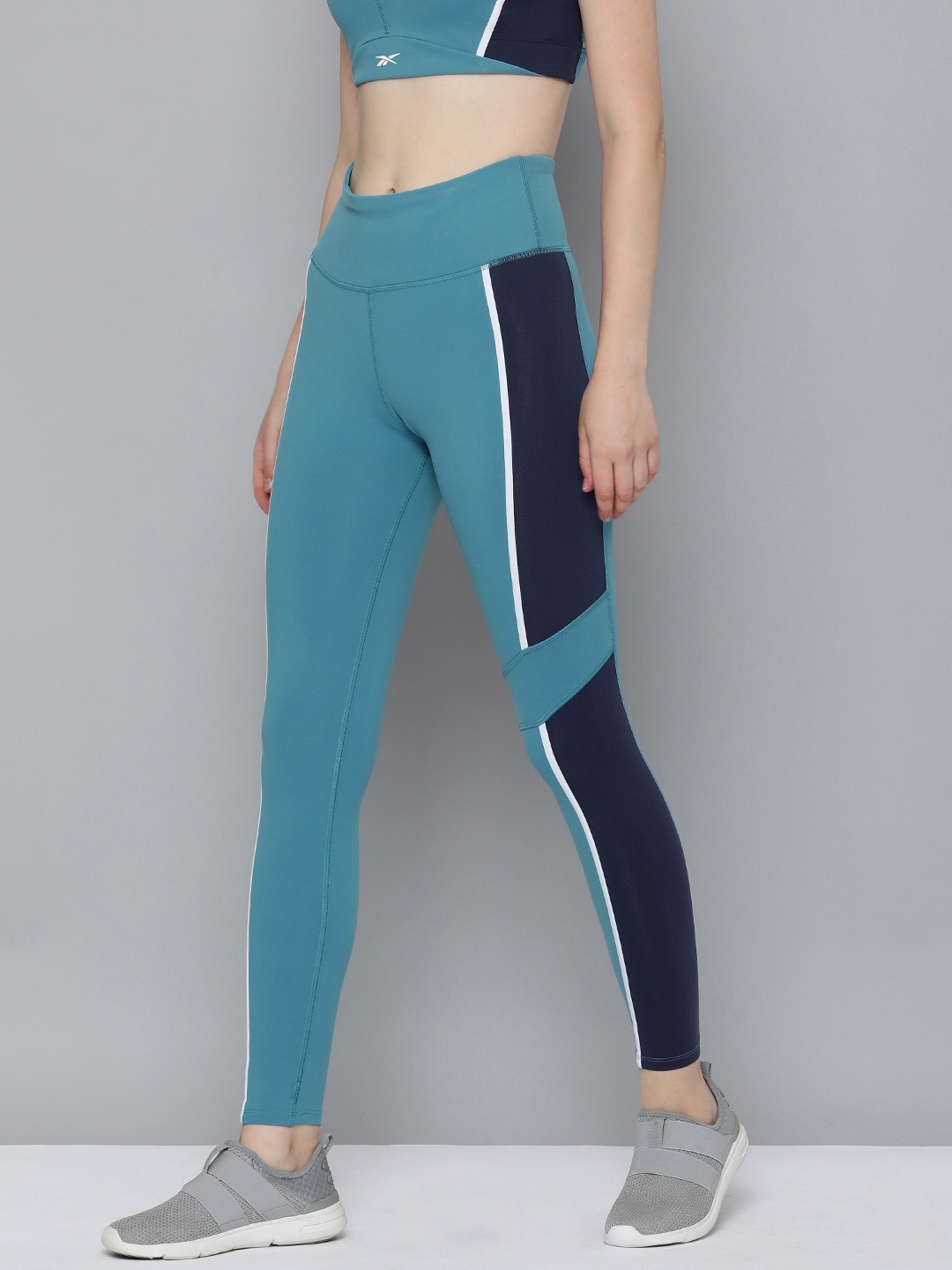 

Reebok Women Colourblocked Ankle Length Sports Tights, Turquoise blue