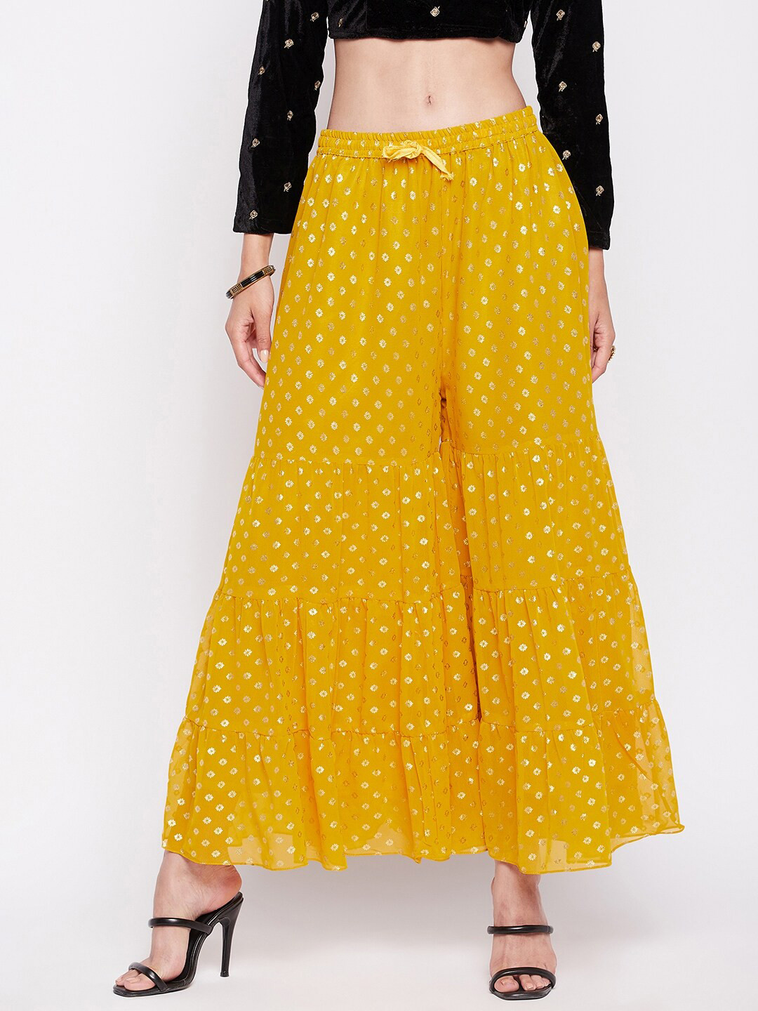 

Clora Creation Women Floral Printed Flared Georgette Palazzos, Mustard