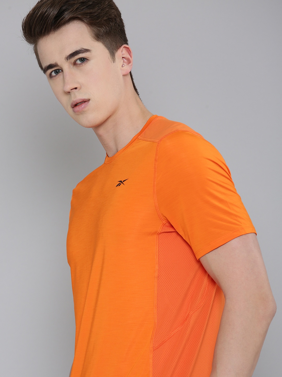 

Reebok Men Brand Logo Printed Sports T-shirt, Orange