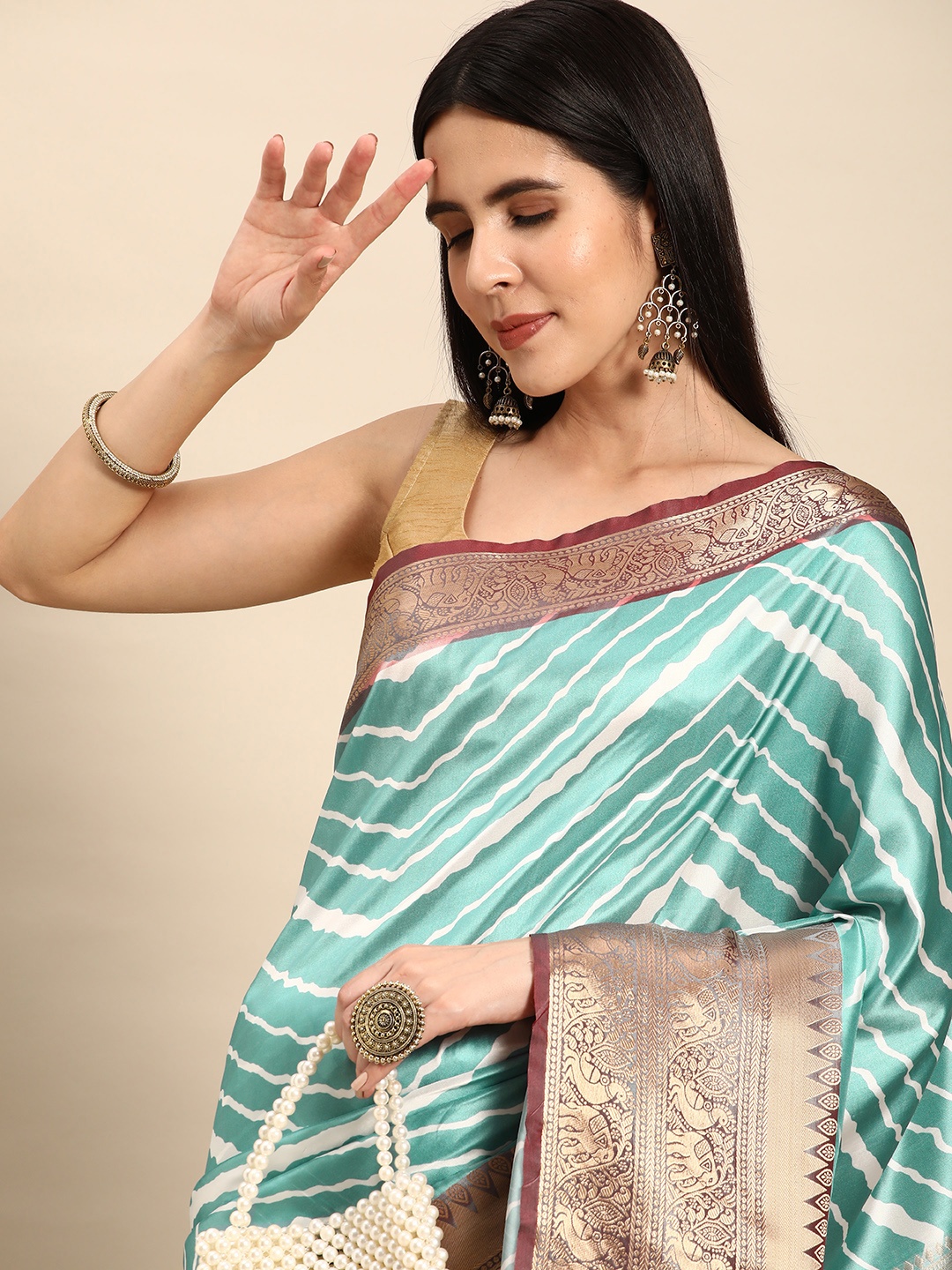 

VASTRANAND Leheriya Printed Zari Silk Blend Banarasi Saree, Blue
