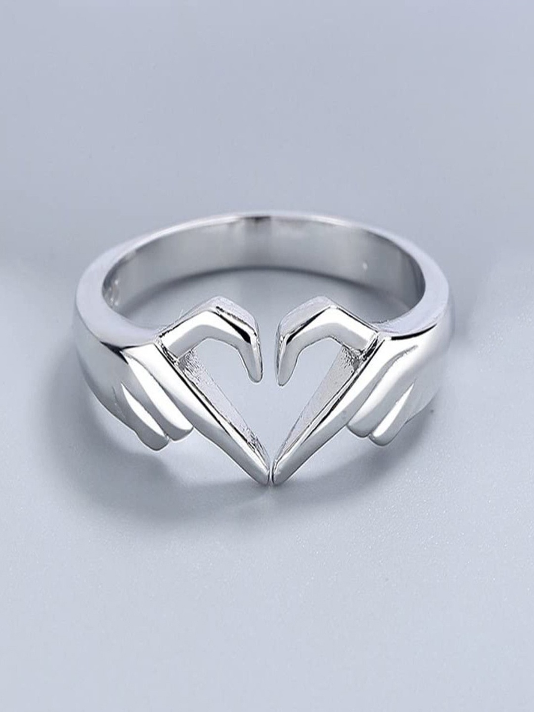 

Silver Shine Silver Plated Heart Hugging Adjustable Finger Ring