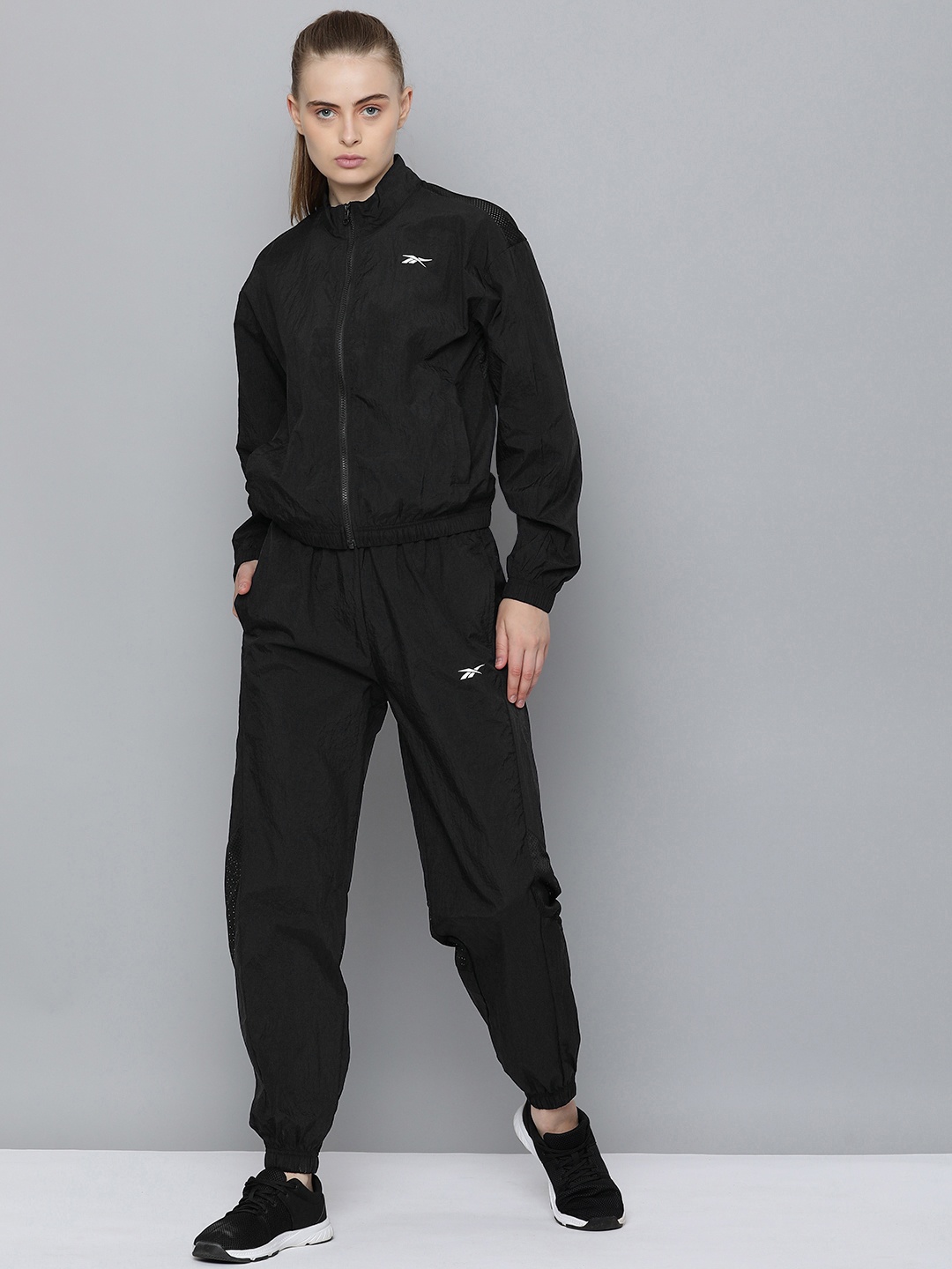 

Reebok Women Solid Track Suit, Black