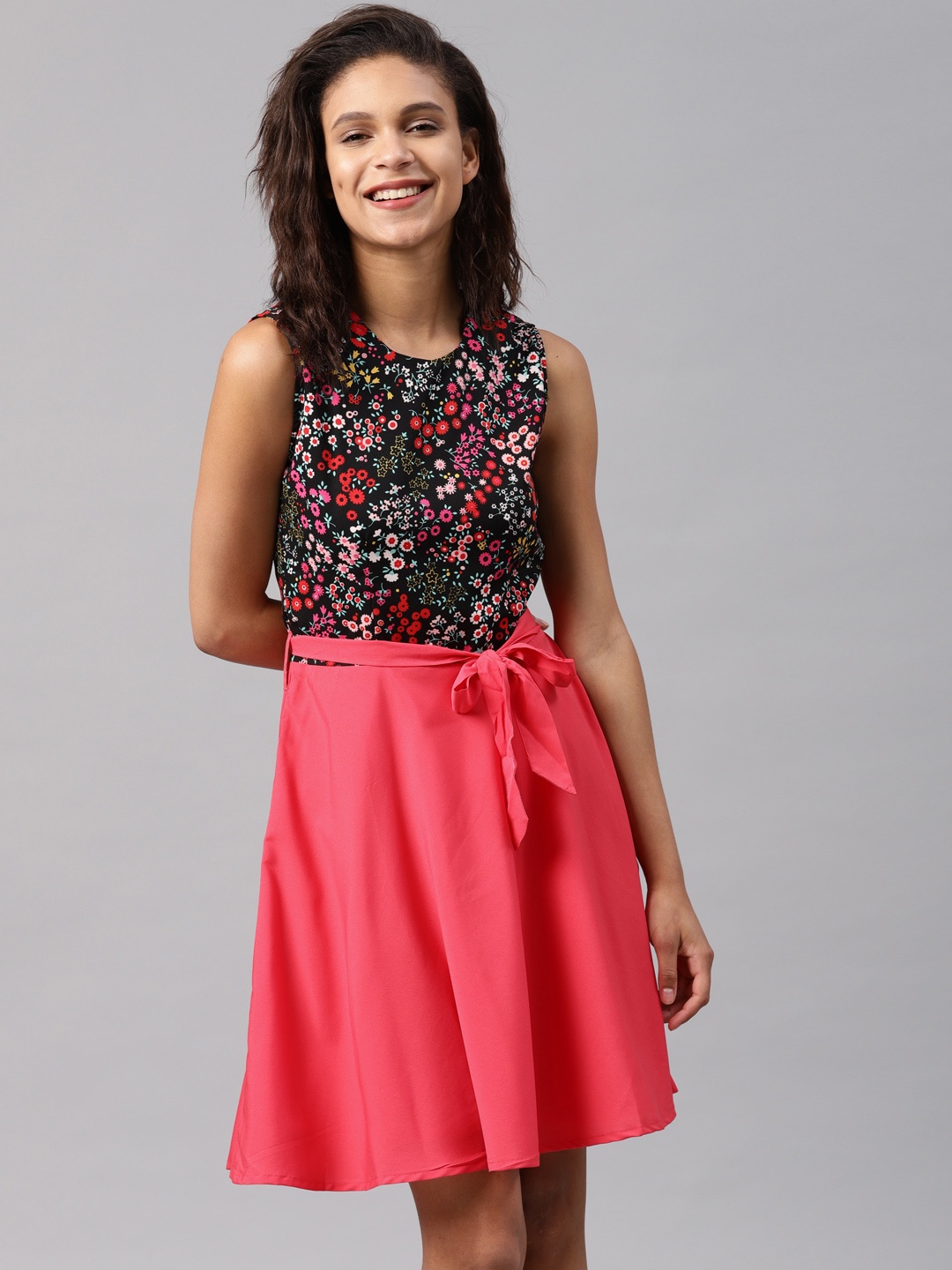 

Tokyo Talkies Women Coral Printed Fit and Flare Dress