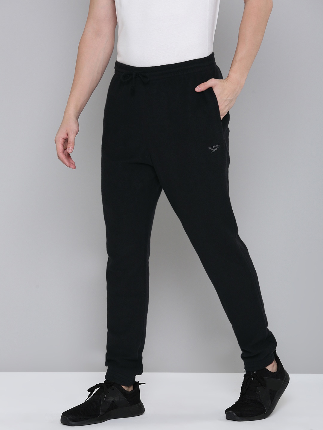 

Reebok Men Solid Track Pants, Black