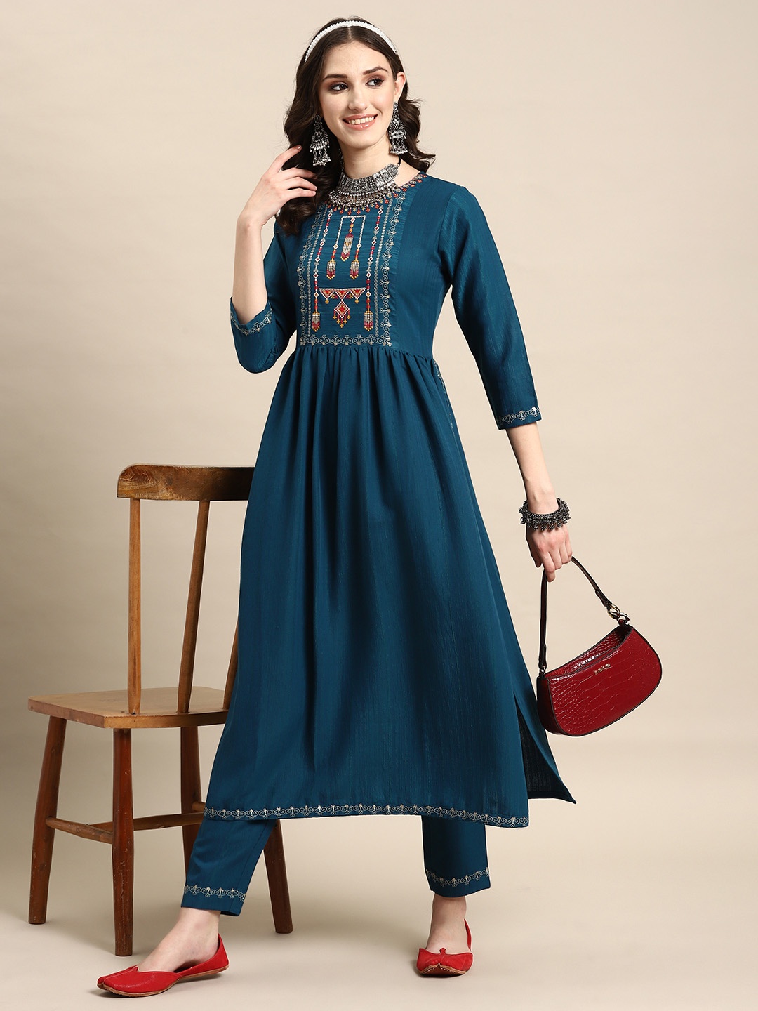 

Sangria Women Ethnic Motifs Yoke Design Embroidered Sequinned Kurta with Trousers, Blue