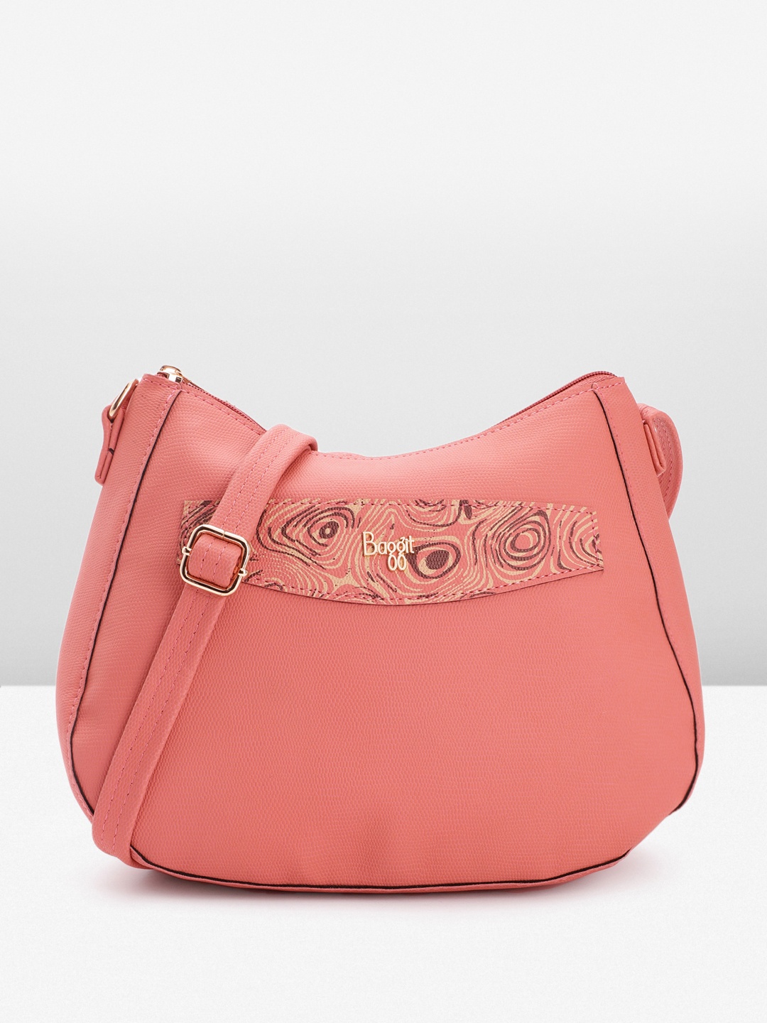 

Baggit Abstract Textured Sling Bag, Coral