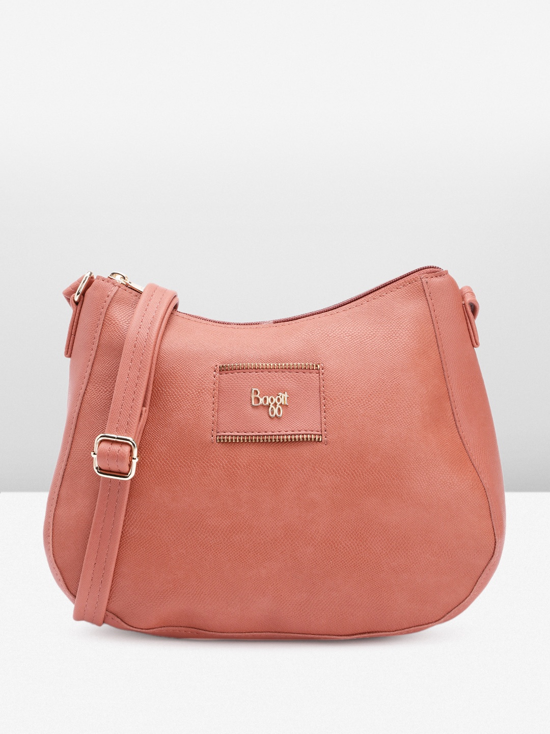 

Baggit Women Textured Sling Bag, Coral