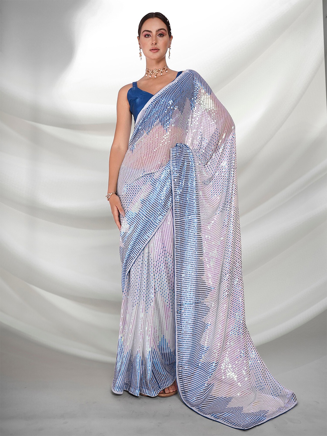 

Kalista Striped Embellished Sequinned Pure Georgette Saree, Blue