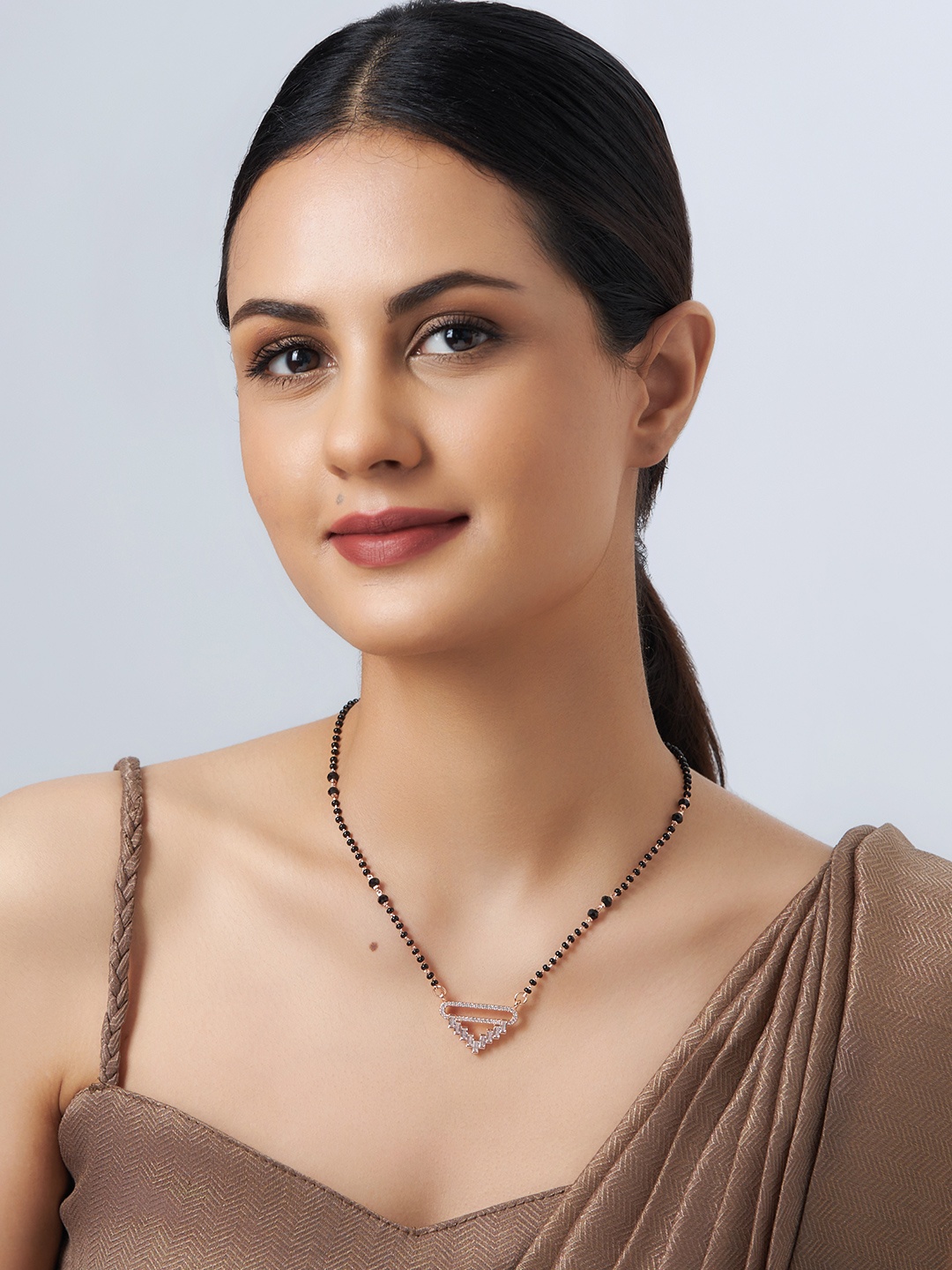 

Kushal's Fashion Jewellery Rose Gold-Plated Zircon Studded & Beaded Mangalsutra