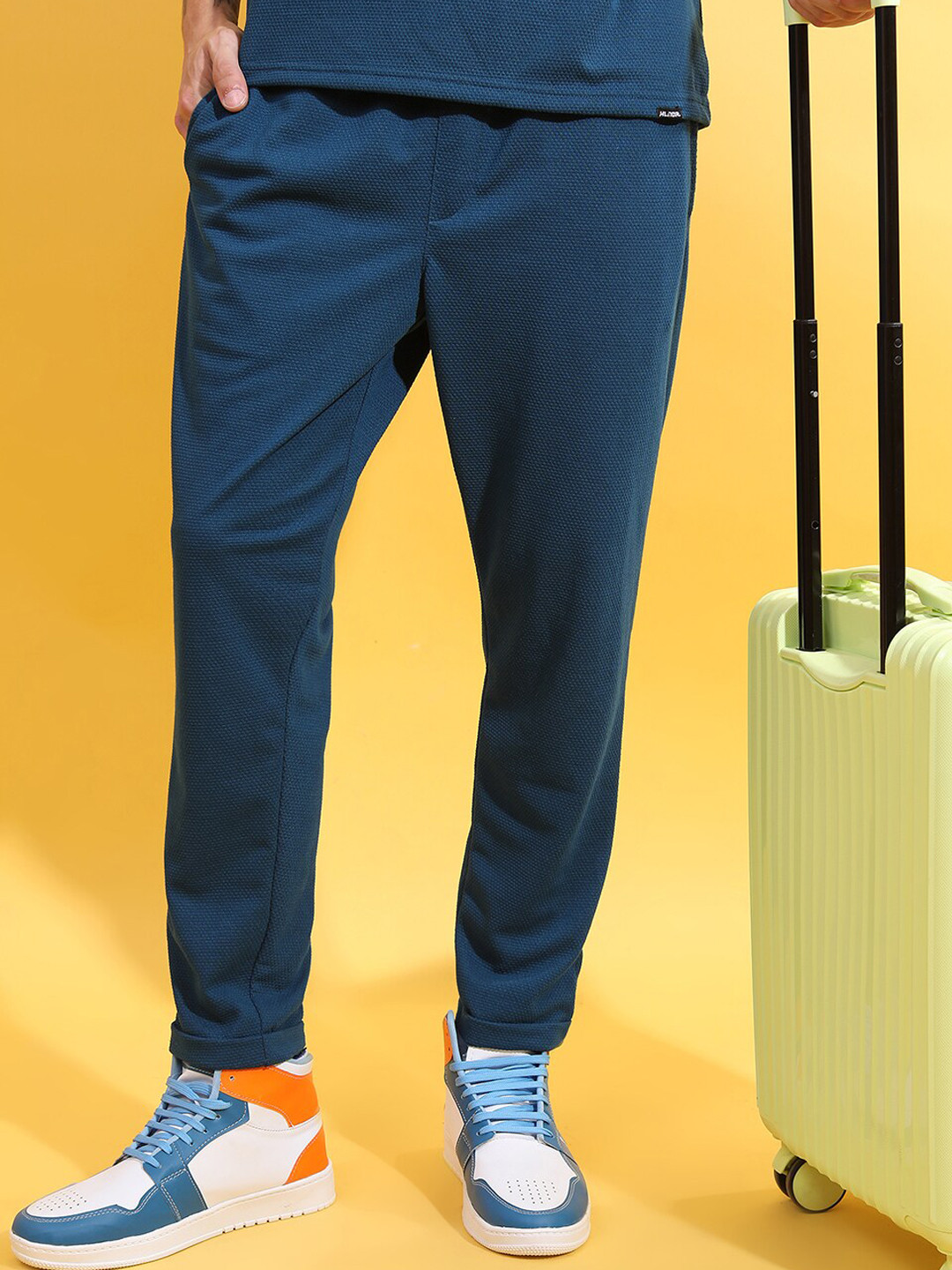 

HIGHLANDER Men Teal Blue Self Design Mid-Rise Slim-Fit Track Pants