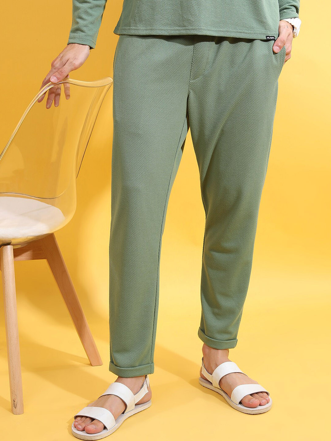 

HIGHLANDER Men Green Slim-Fit Mid-Rise Self Design Track Pants