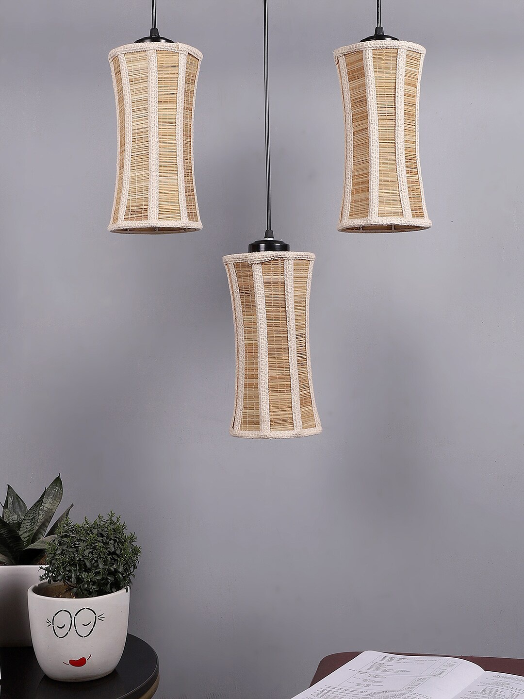 

Devansh Beige & Black Textured Damru Bamboo Ceiling Lamp