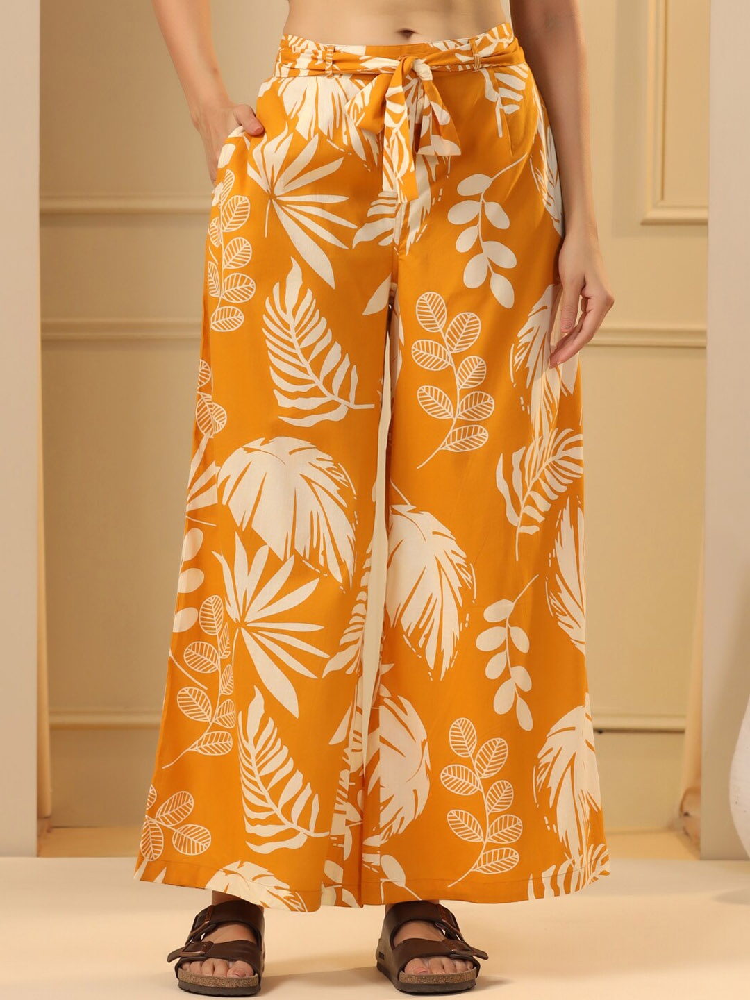 

SANSKRUTIHOMES Women Mustard Yellow & White Floral Printed Flared Cotton Palazzos