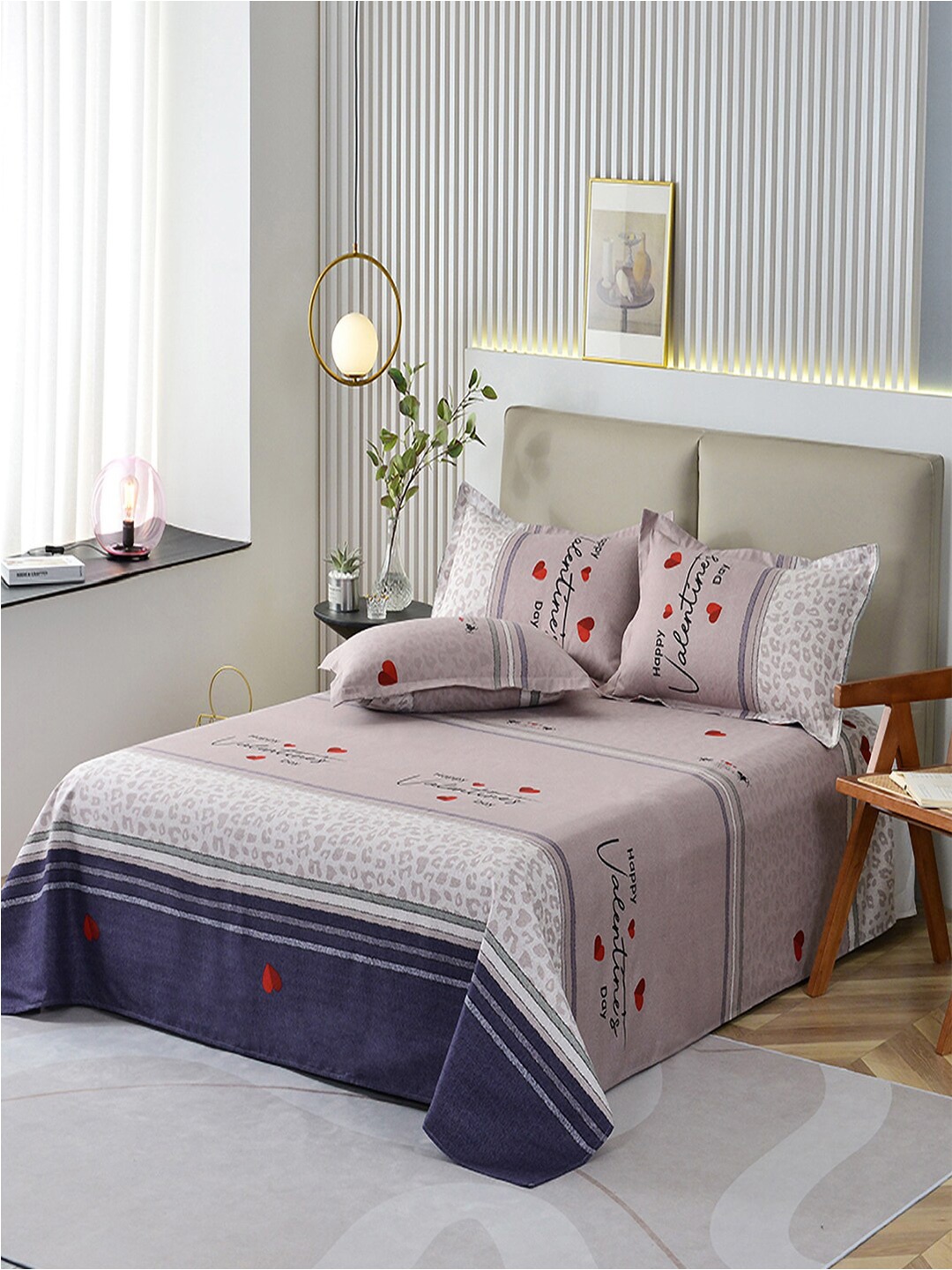 

JC Collection Purple & Navy Blue Printed 140 TC King Bedsheet & 2 Pillow Covers