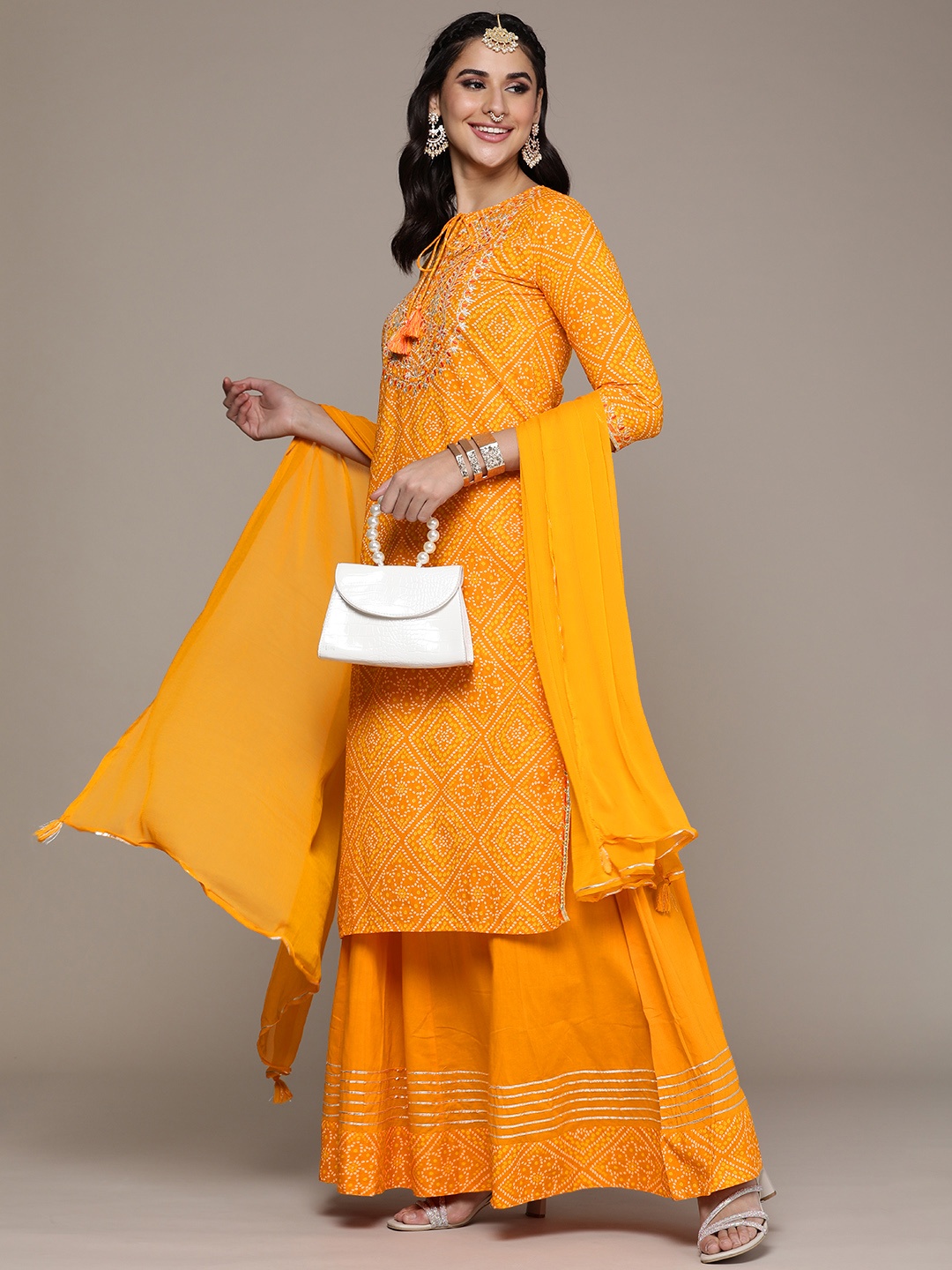 

Anouk Women Printed Regular Gotta Patti Kurta with Palazzos & With Dupatta, Orange
