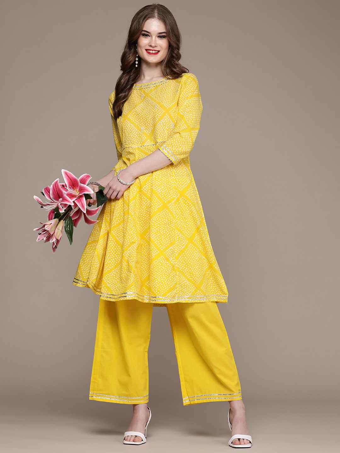 

Anouk Women Yellow Printed Regular Gotta Patti Kurta with Skirt