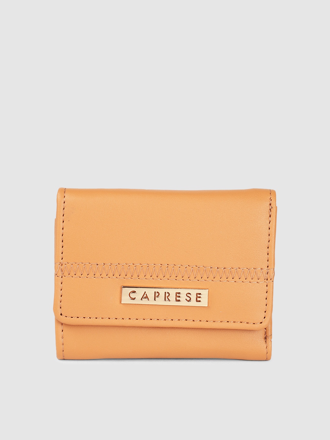 

Caprese Women Solid Three Fold Wallet, Mustard