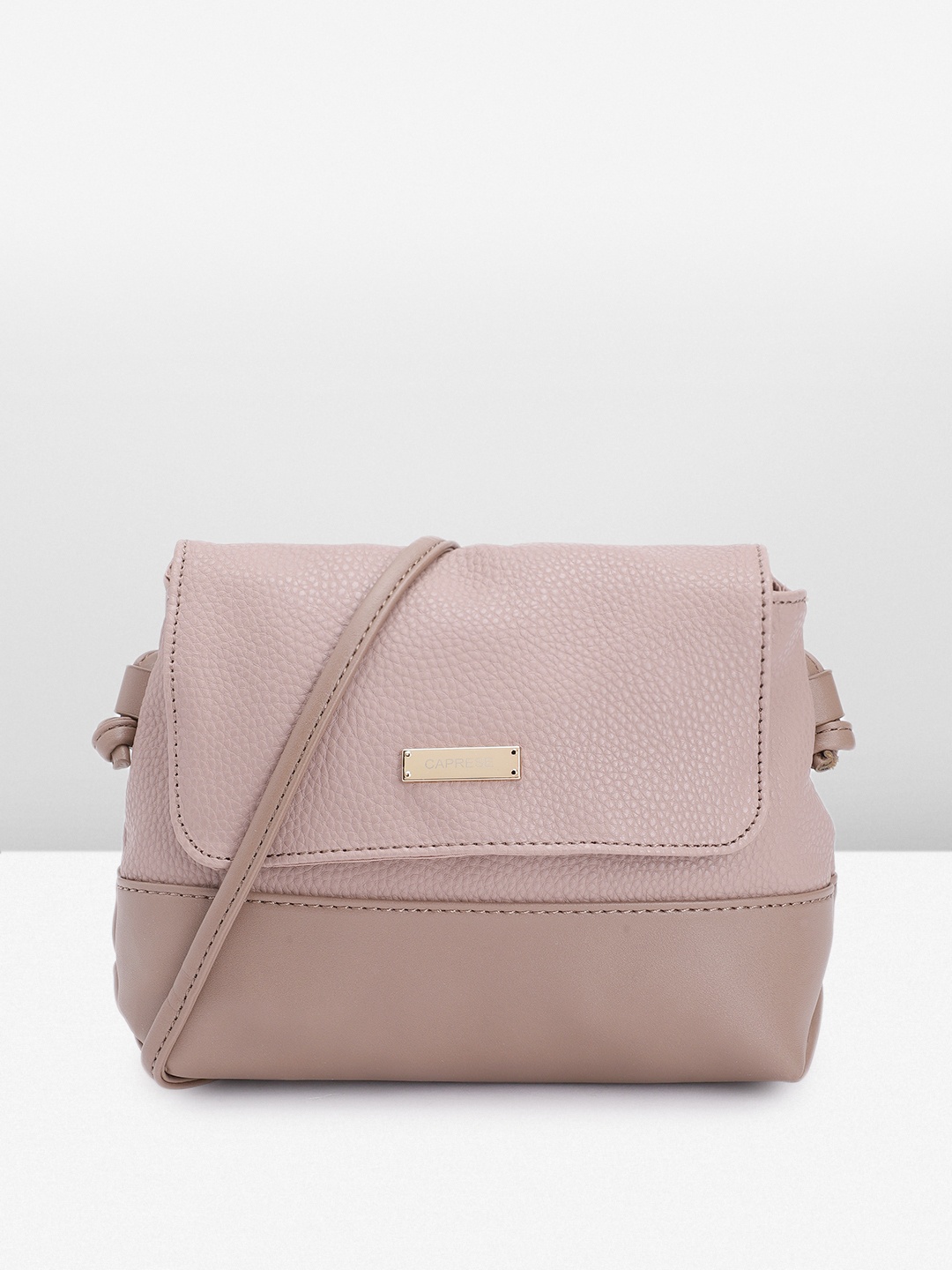 

Caprese Women Solid Sling Bag, Pink