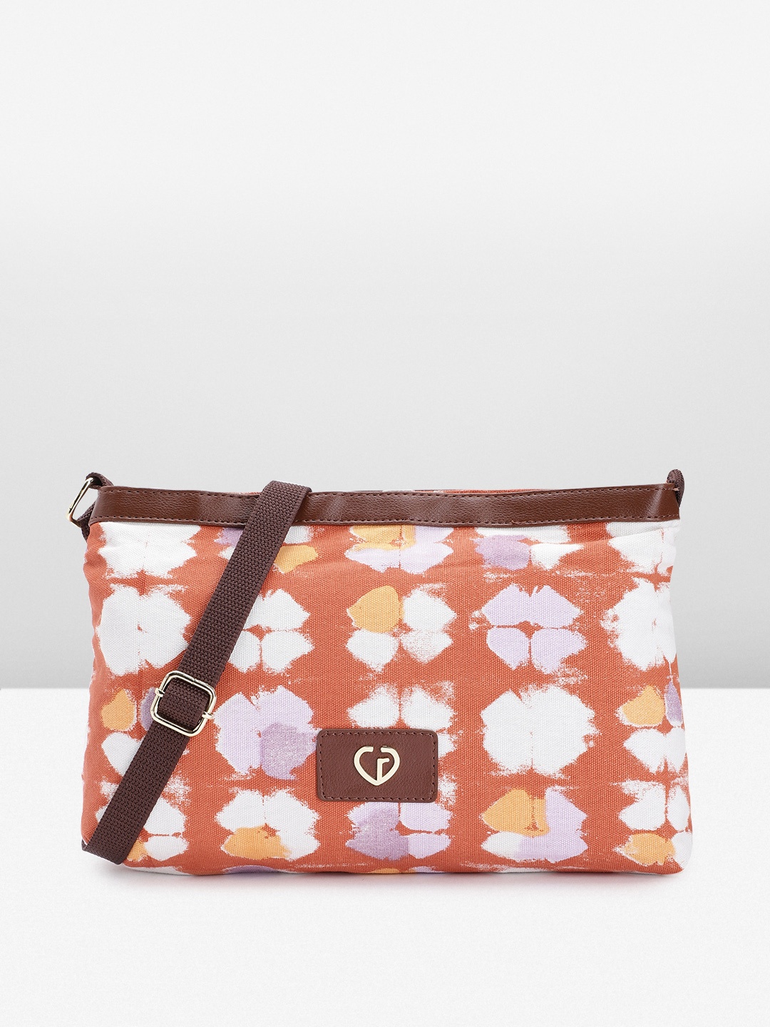 

Caprese Abstract Printed Structured Sling Bag, Rust