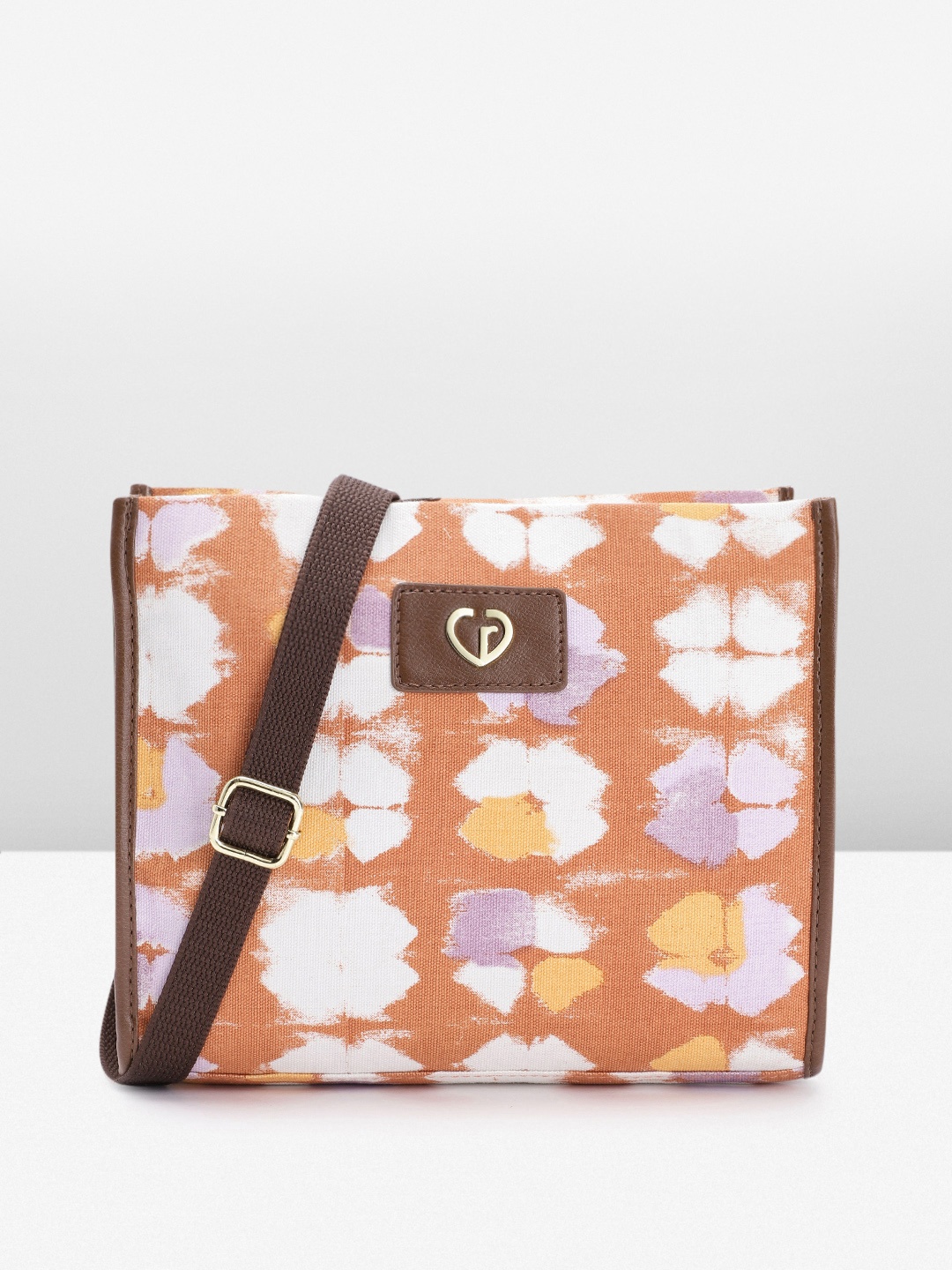

Caprese Abstract Printed Structured Sling Bag, Rust