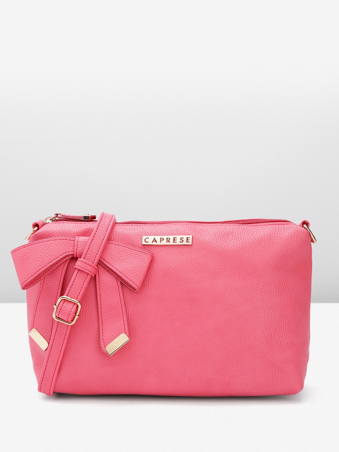 

Caprese Women Solid Sling Bag, Pink