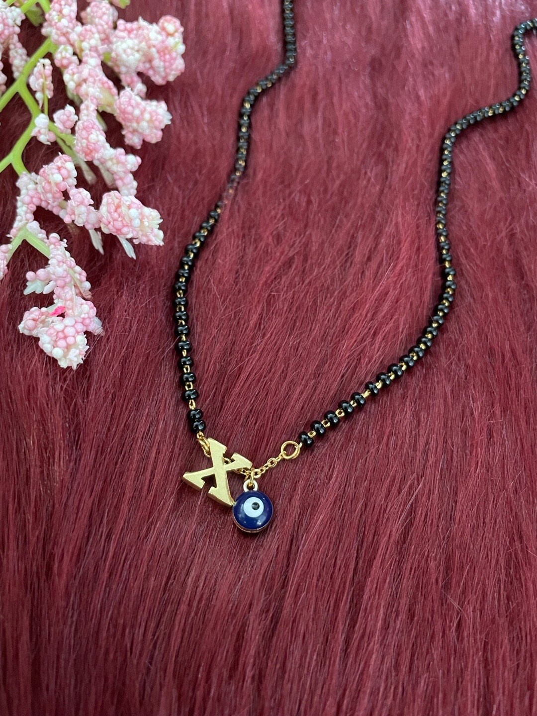 

Digital Dress Room Gold-Plated Beaded Evil Eye Charm Mangalsutra