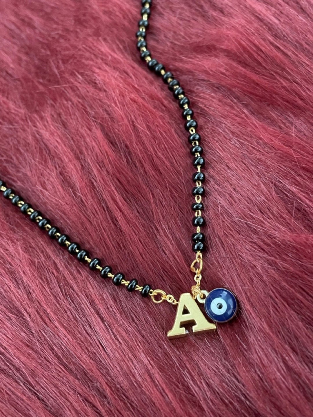 

Digital Dress Room Gold-Plated Beaded Evil Eye Charm Mangalsutra