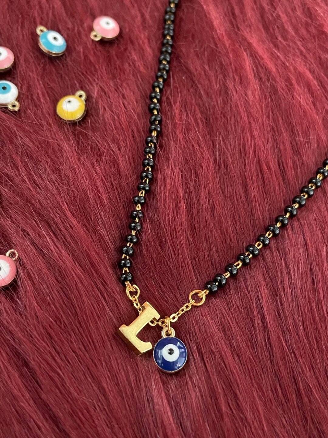 

Digital Dress Room Gold-Plated Beaded Evil Eye Charm Mangalsutra