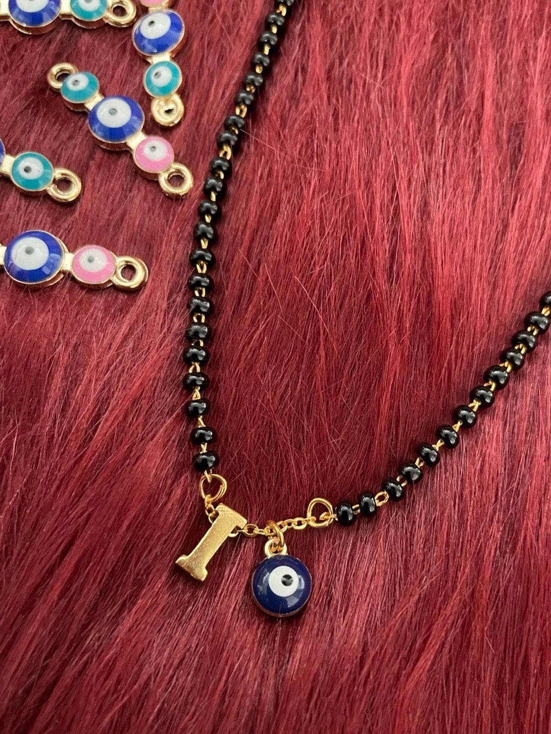 

Digital Dress Room Gold-Plated Beaded Evil Eye Charm Mangalsutra