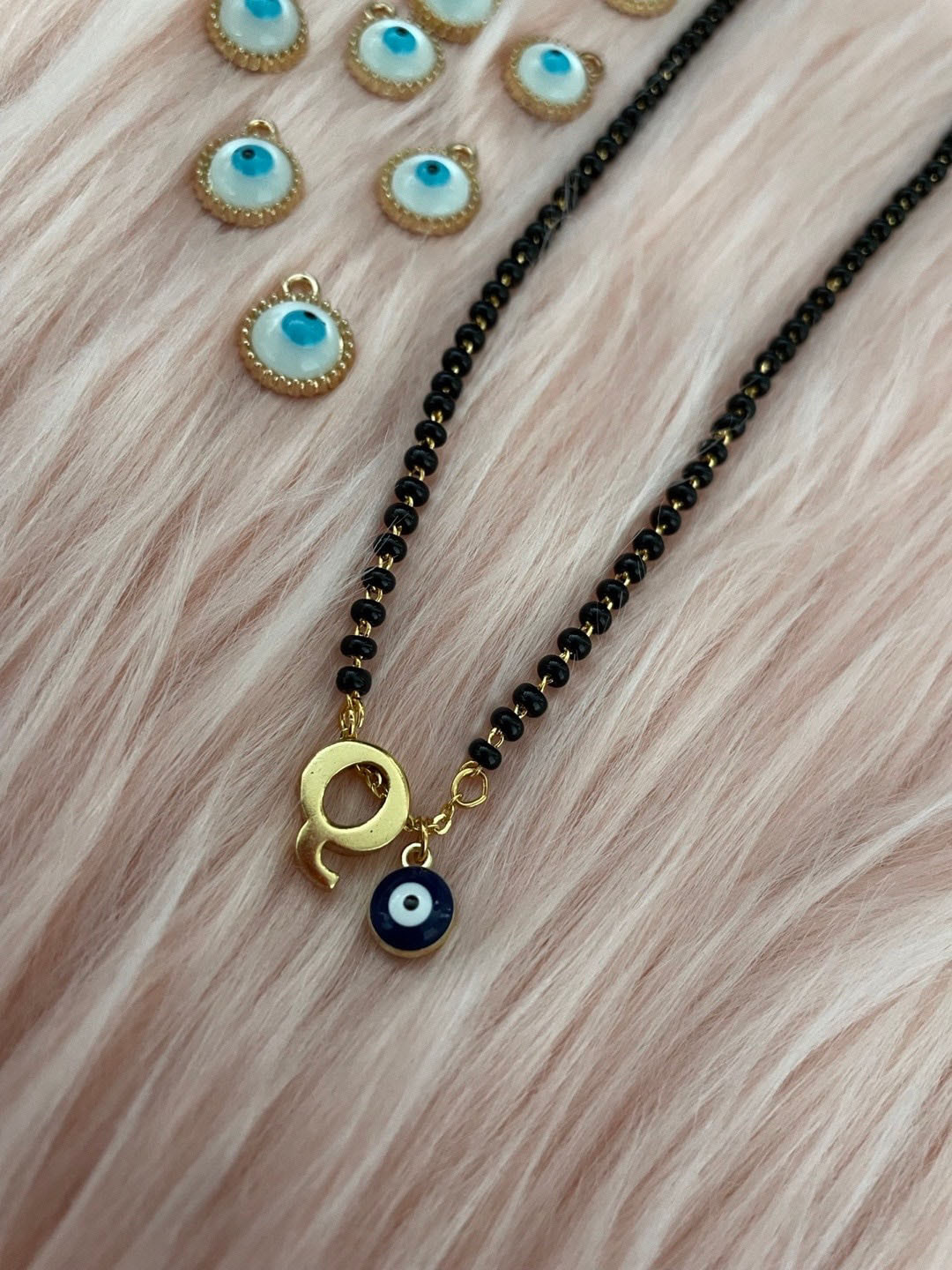 

Digital Dress Room Gold-Plated Beaded Q Letter Alphabet Evil Eye Mangalsutra